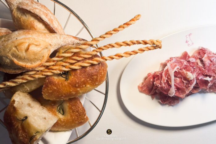 House Made Bread Selection & Thin Slices of Noir de Bigorre Ham