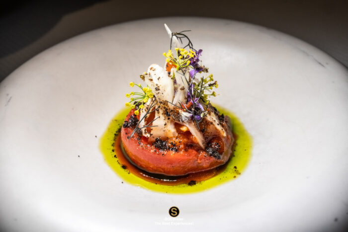 French cheese selection served with edible flowers at Signature Bangkok