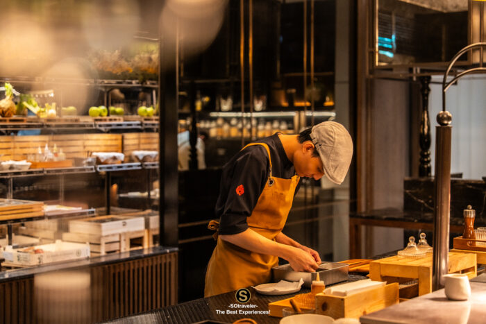 Michelin Star fish course with pansy flower garnish Signature Bangkok