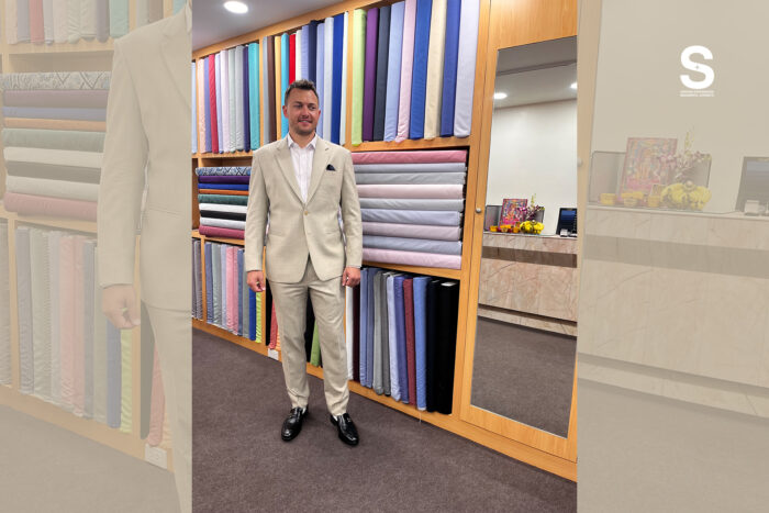 Client wearing a tailored bespoke suit at Velour Waza, known as the best tailor in Sukhumvit