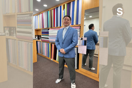 Best tailor Bangkok Velour Waza Sukhumvit 33 displaying suit jackets and fabric rolls